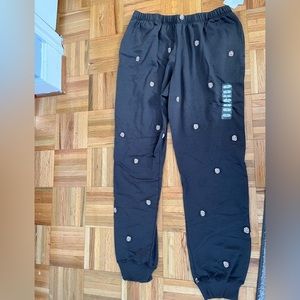 gray rose patterned joggers, size large
